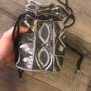 From St Xavier Beaded Drawstring Crossbody